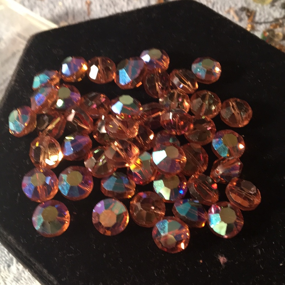 Gorg .. topaz colored round crystal beads